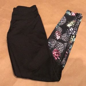 Black leggings with colored pineapples